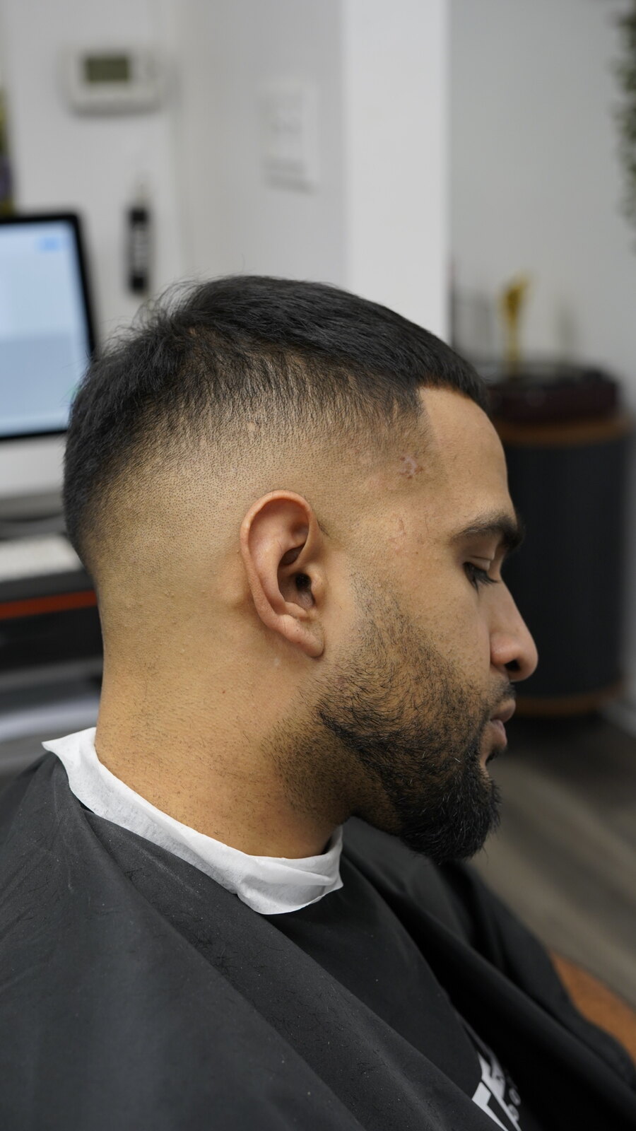 Fresh tapered haircut and beard styling at fyf North