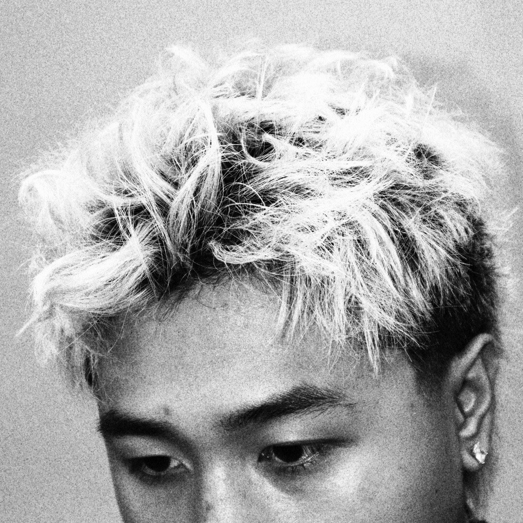 Platinum blonde textured crop by Marcus Dela Cruz